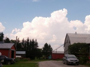 barn and clouds